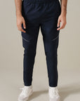 MEN REFLECT TAPERED TRACK PANTS