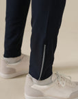 MEN REFLECT TAPERED TRACK PANTS