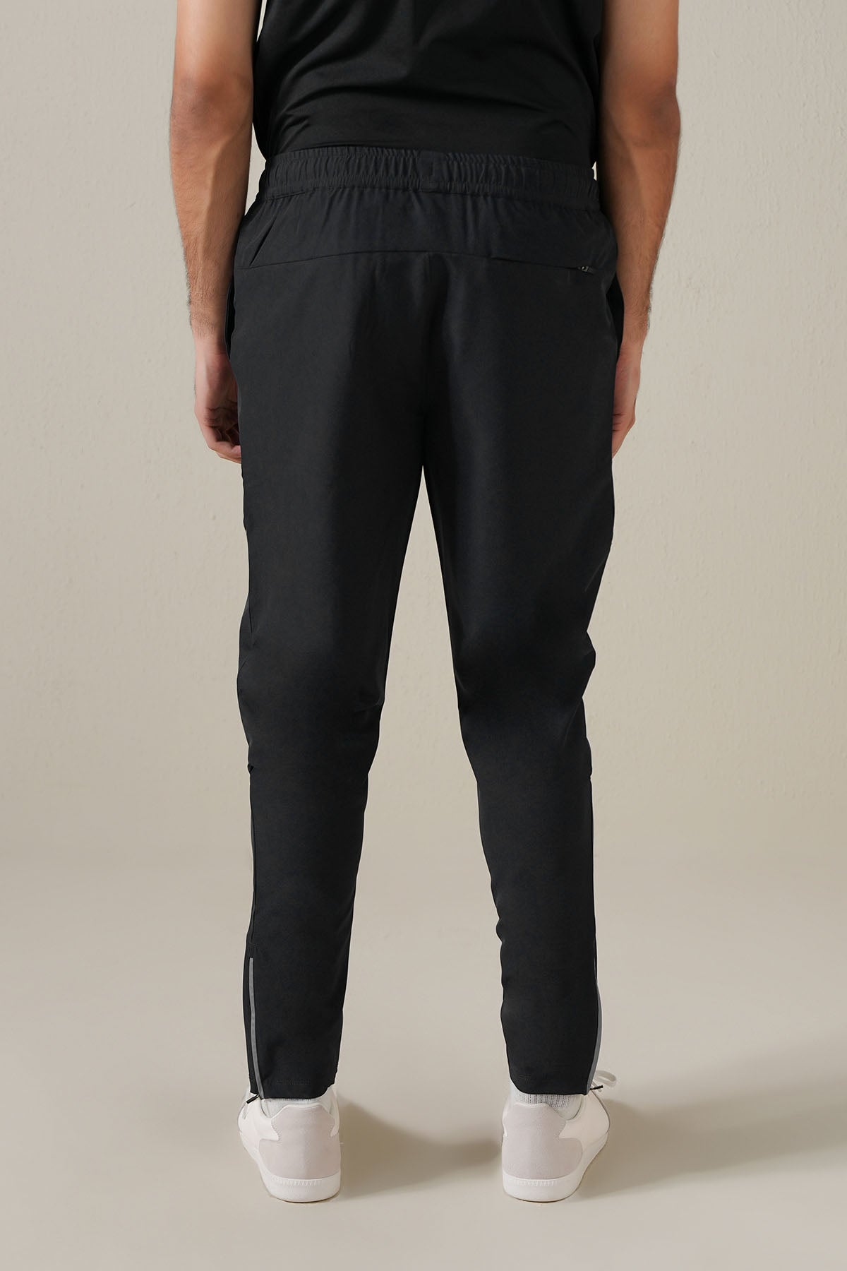 MEN REFLECT TAPERED TRACK PANTS