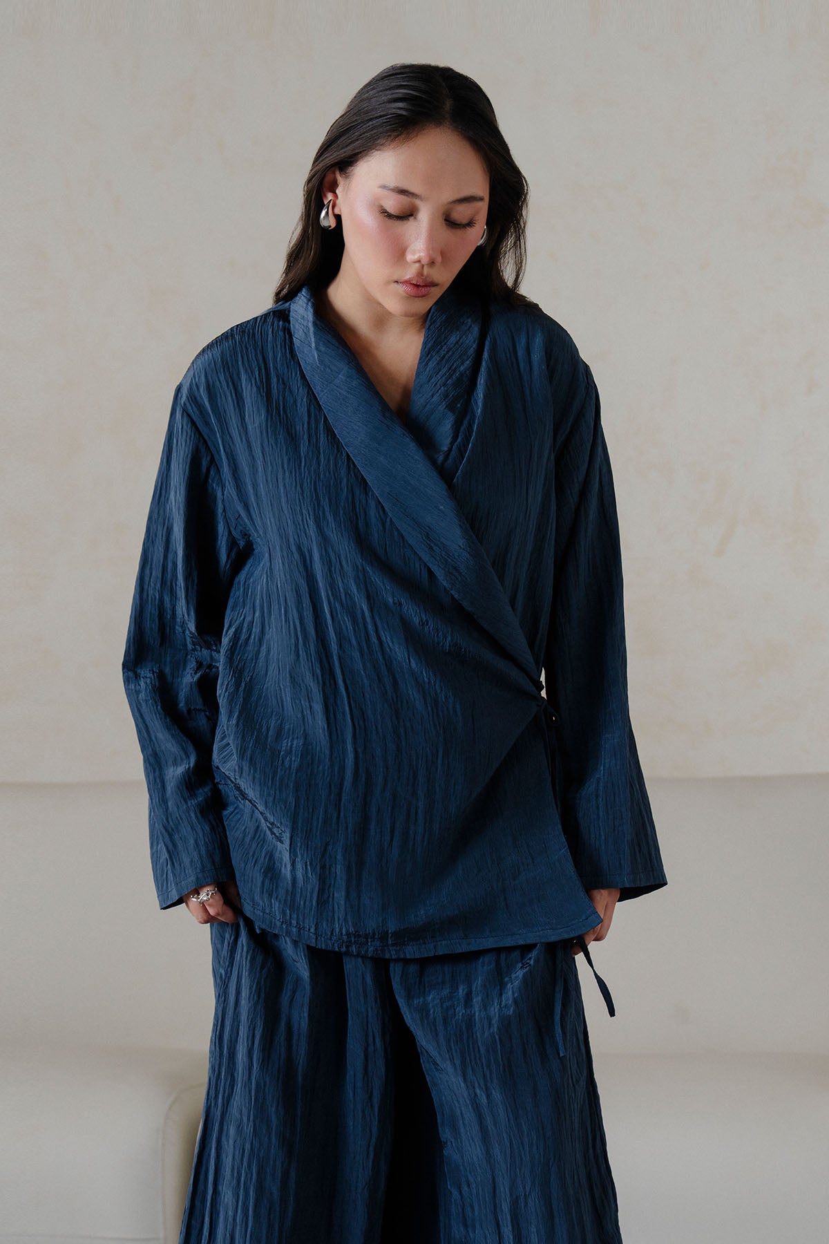TEXTURED WRAP FLARED PANTS