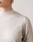 ESSENTIAL MOCK NECK SWEATER